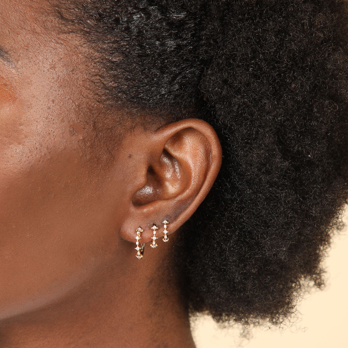 Cosmic Star 6.5mm Hoop in Gold worn with 8mm & 11.5mm