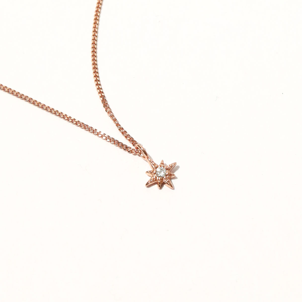 Twilight Star Pendant Necklace in Rose Gold close up shot of the pendant