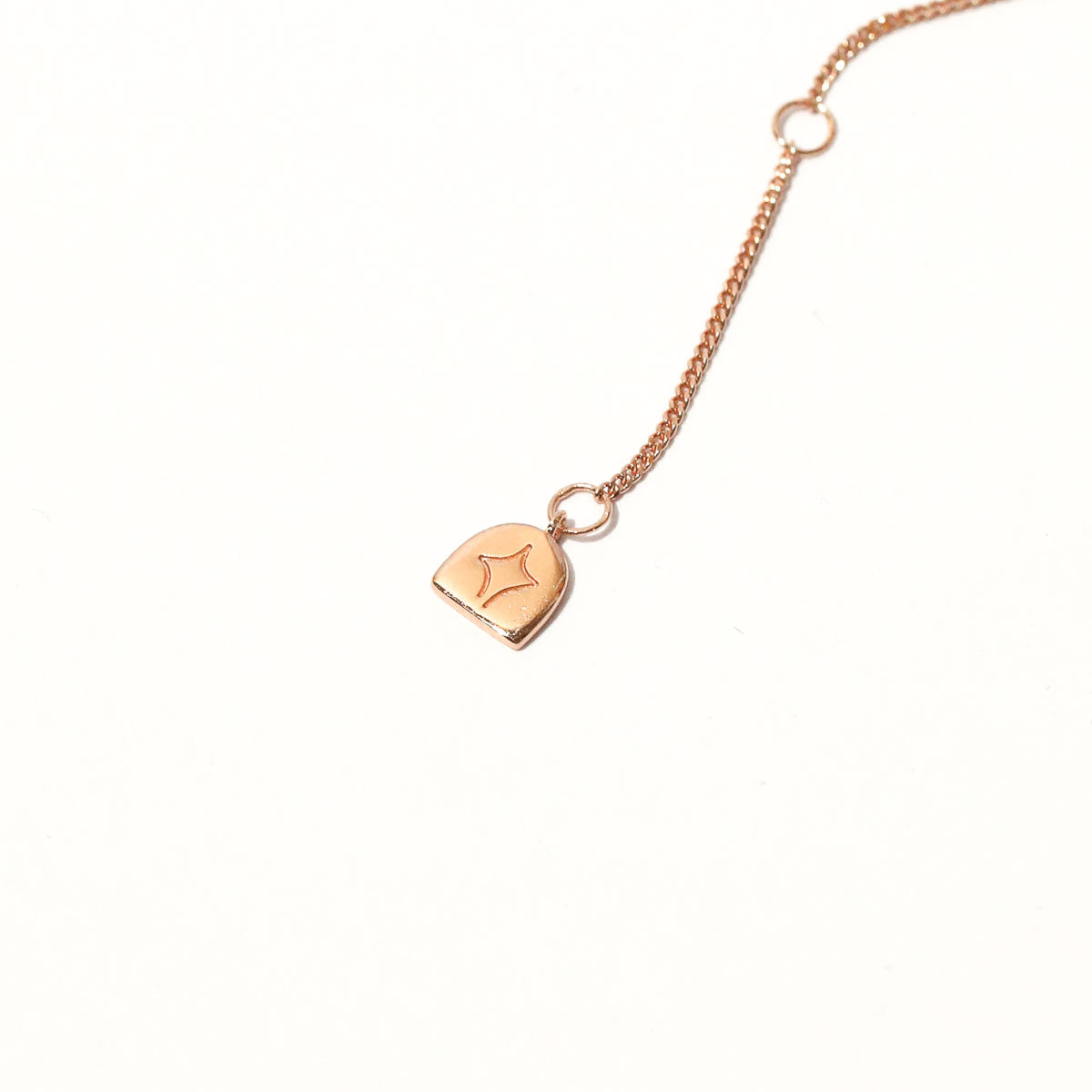 Twilight Star Pendant Necklace in Rose Gold close up