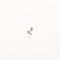 Twilight Star Charm Piercing Stud in Solid Gold flat lay