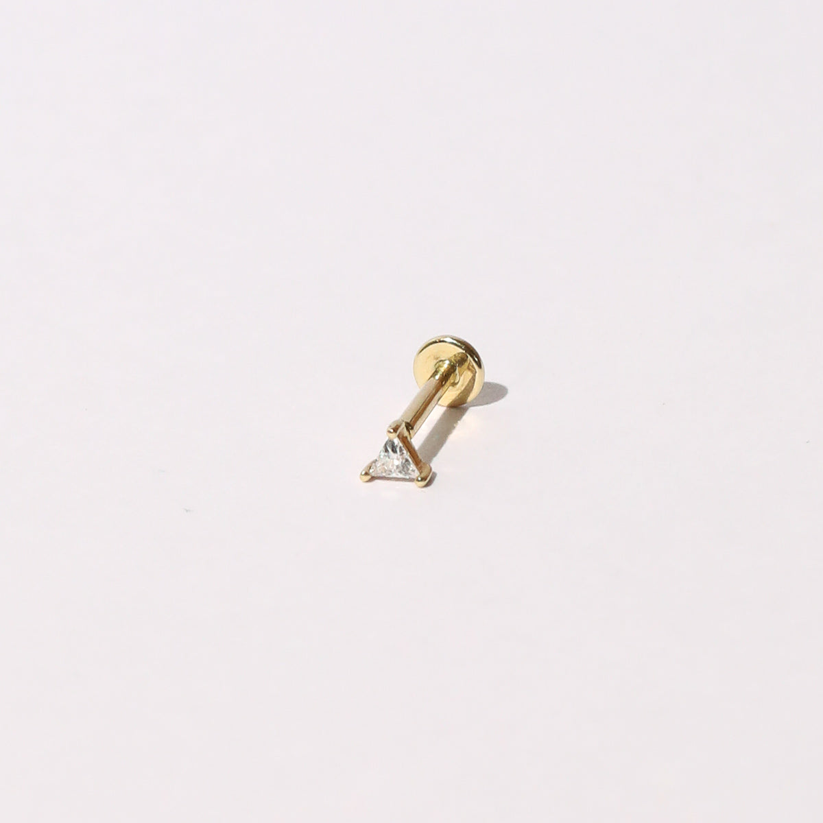 Triangle Piercing Stud 6mm in Solid Gold flat lay