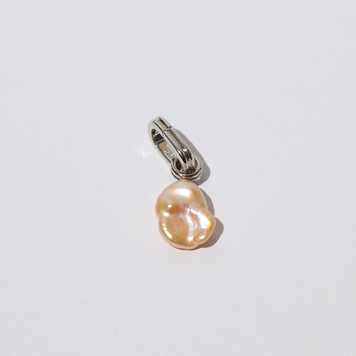 Pearl Pendant Charm in Silver flat lay
