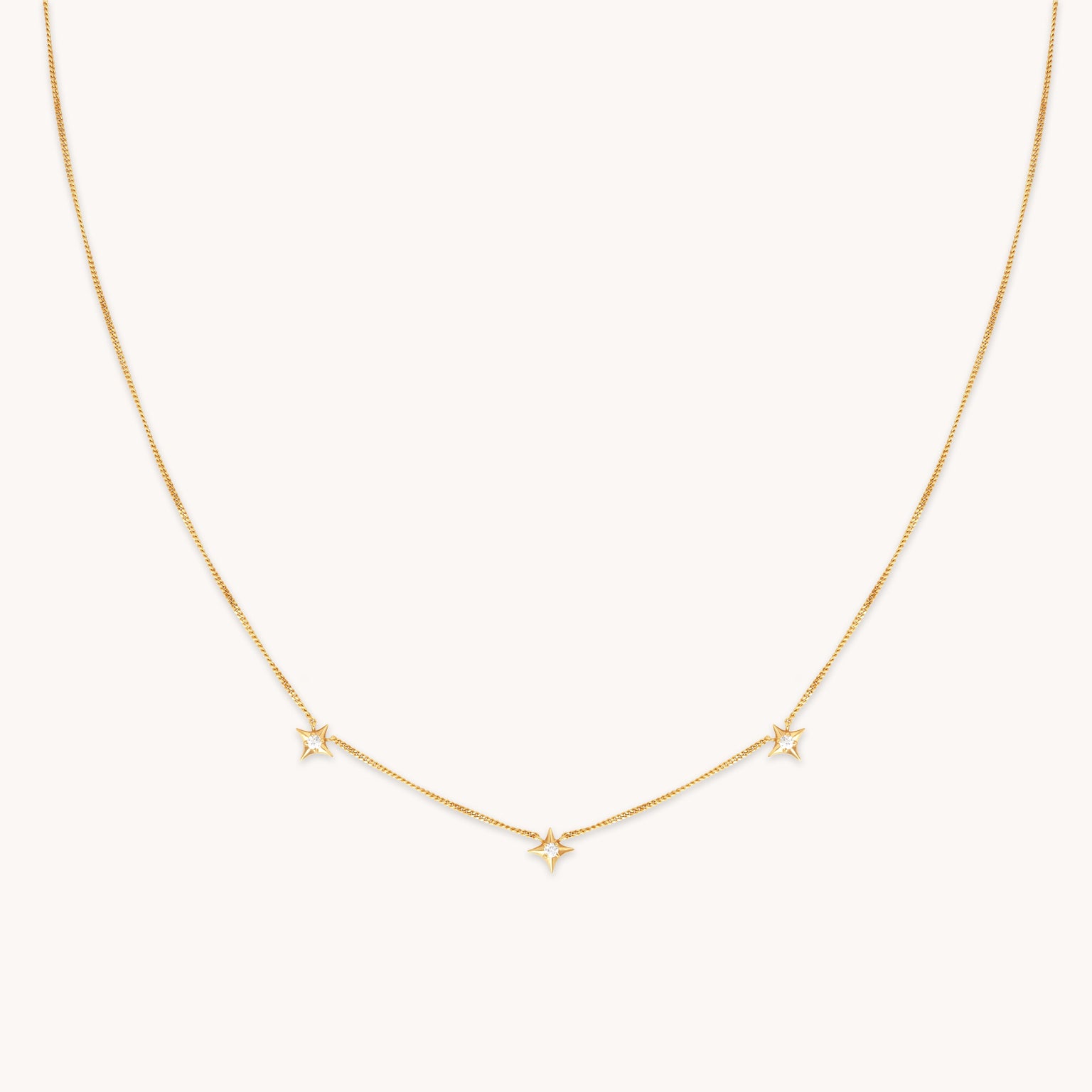 Cosmic Star Charm Necklace in Gold