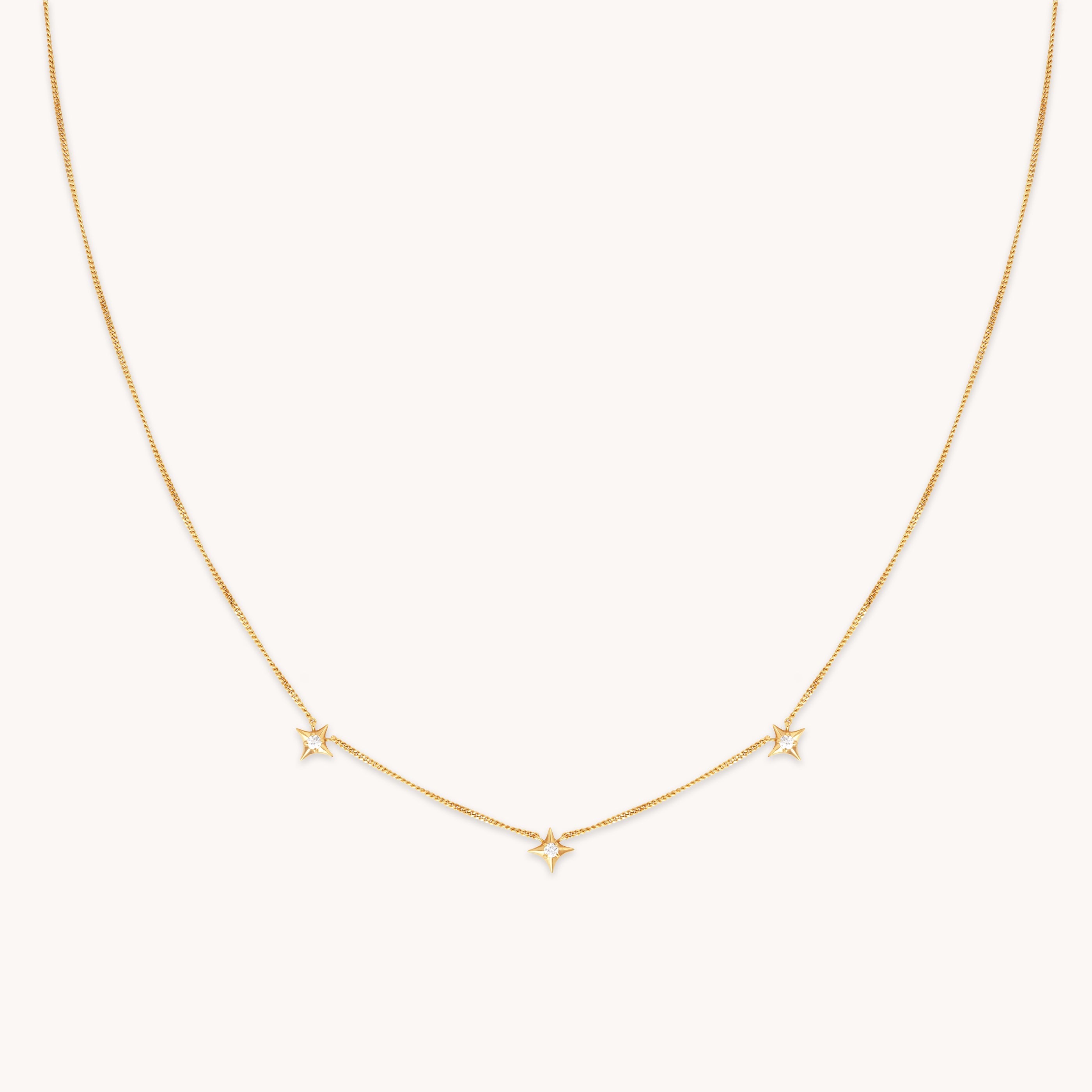 Cosmic Star Charm Necklace in Gold