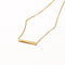 Cosmic Star Bar Necklace in Gold flat lay shot of the back