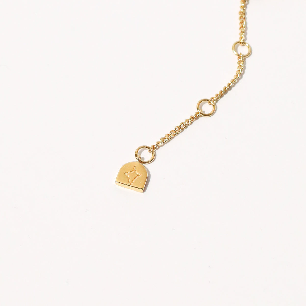 Cosmic Star Bar Necklace in Gold end of necklace