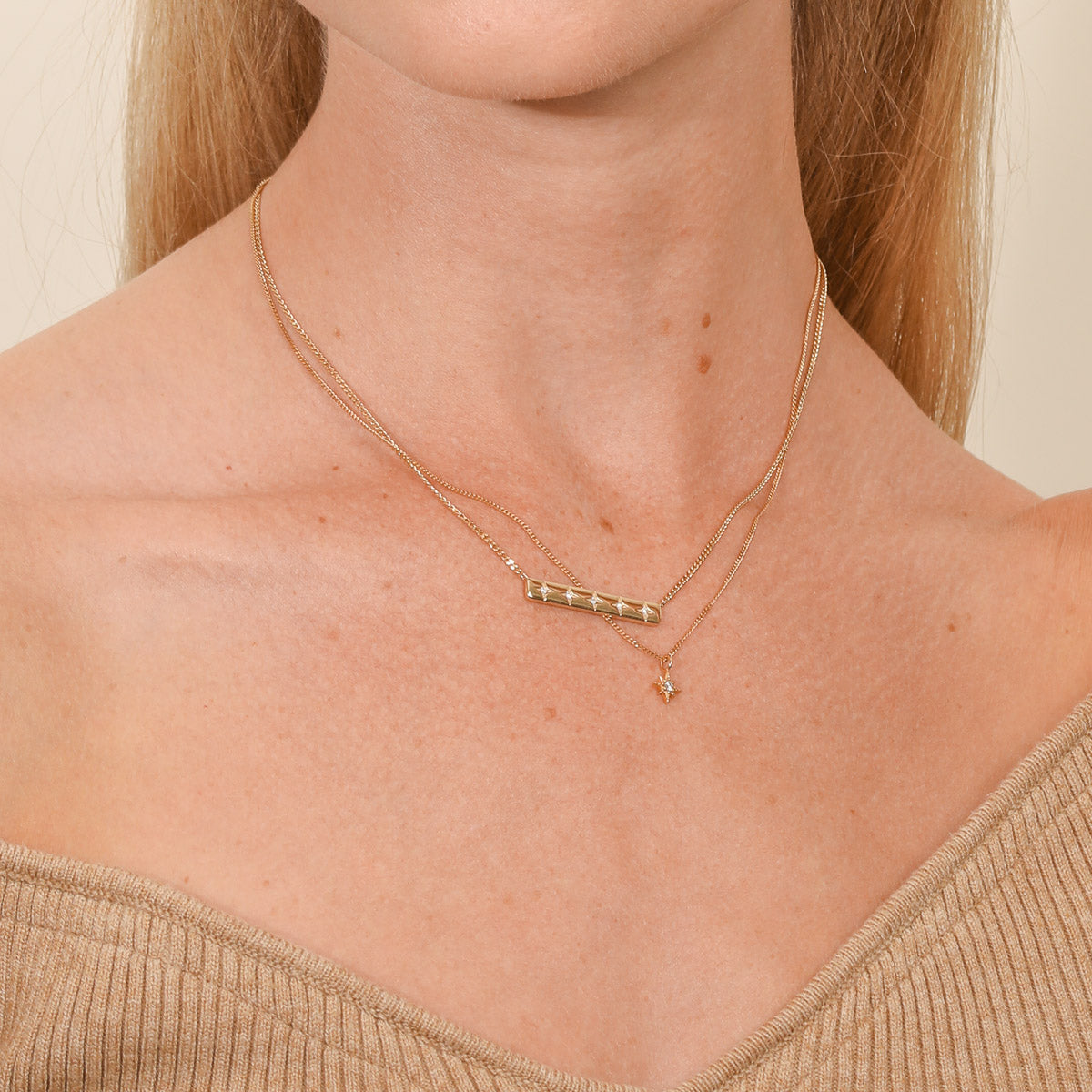 Cosmic Star Bar Necklace in Gold worn layered with twilight star pendant necklace