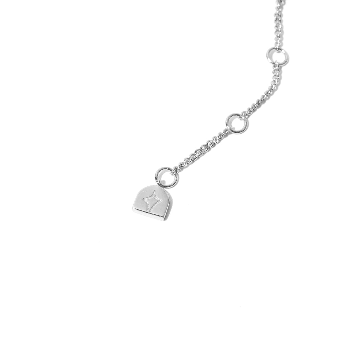Cosmic Star Bar Necklace in Silver end of the necklace charm