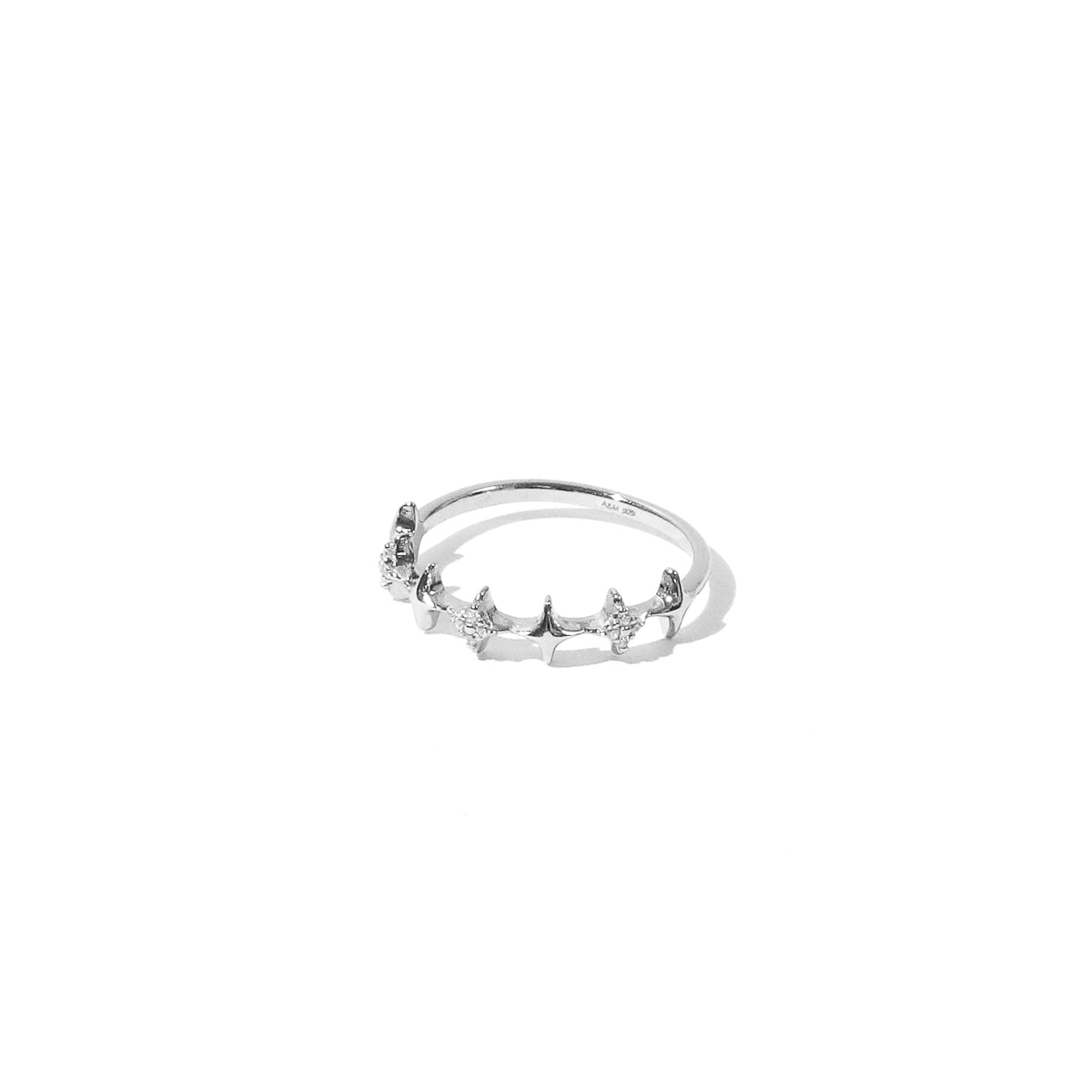 Cosmic Star Stacking Ring in Silver flat lay