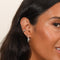 Cosmic Star Stud Earrings in Silver worn in upper lobe piercing