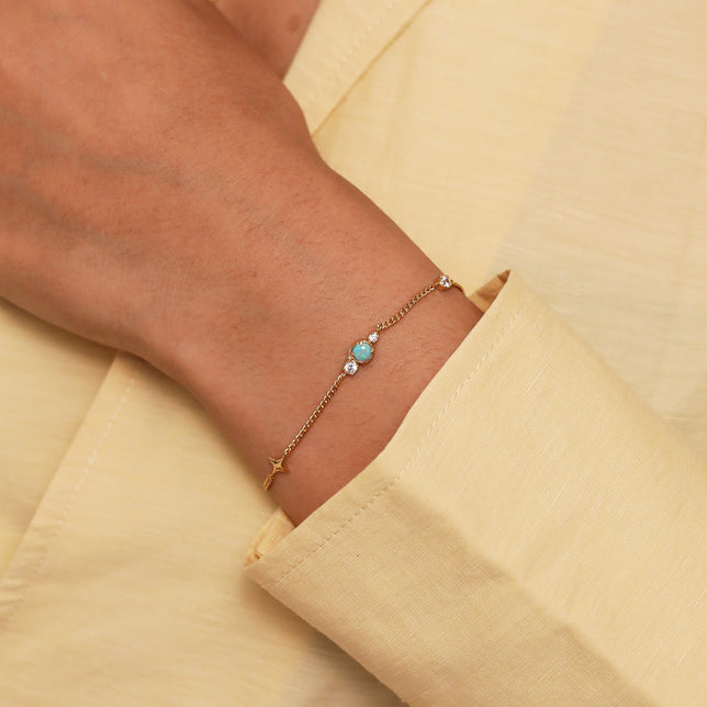 Cosmic Star Opal Bracelet in Gold worn
