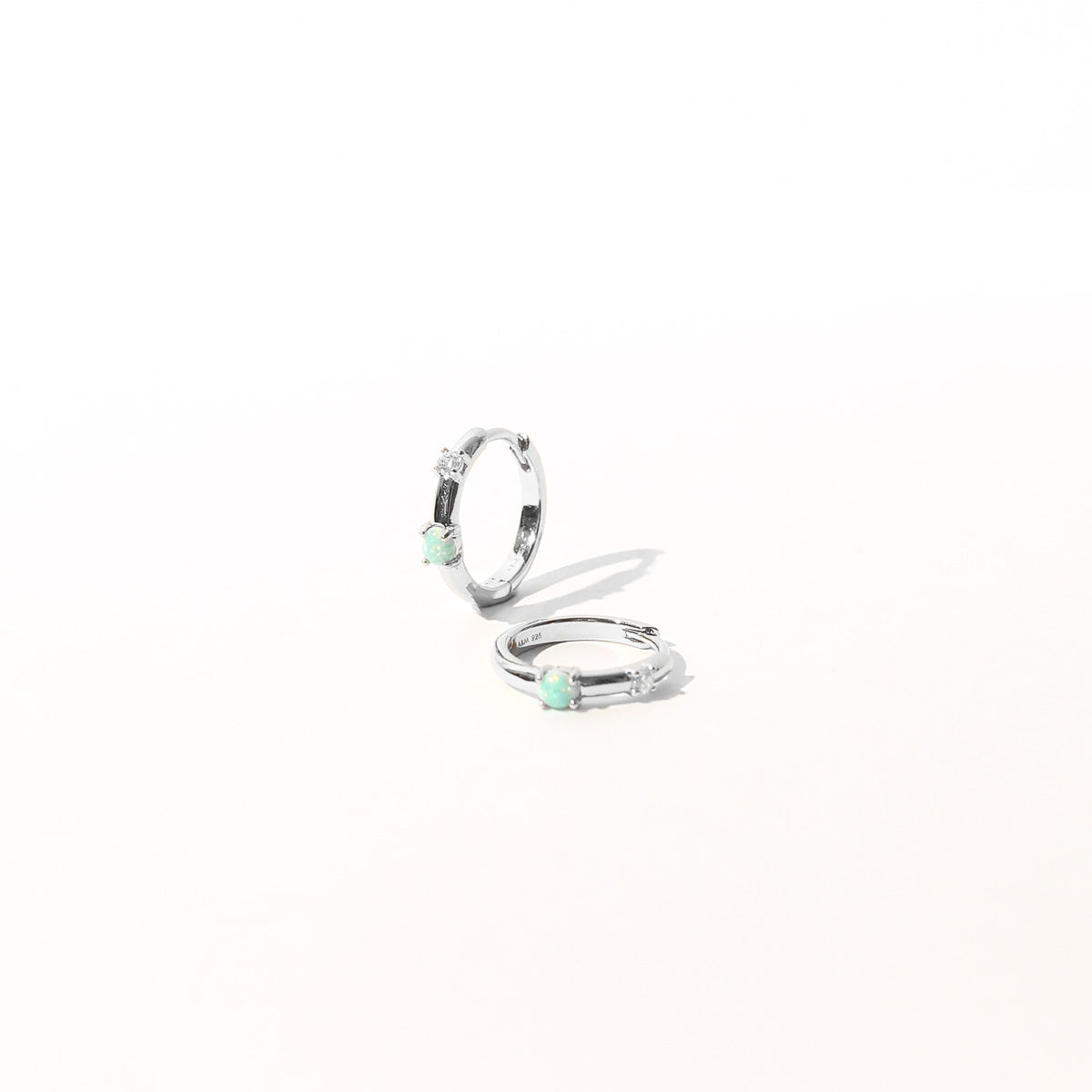 Aura Opal Hoops in Silver flat lay shot