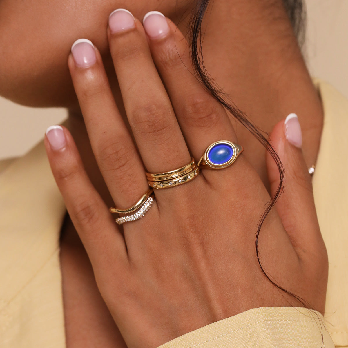 Mood Ring in Gold worn stacked with other rings