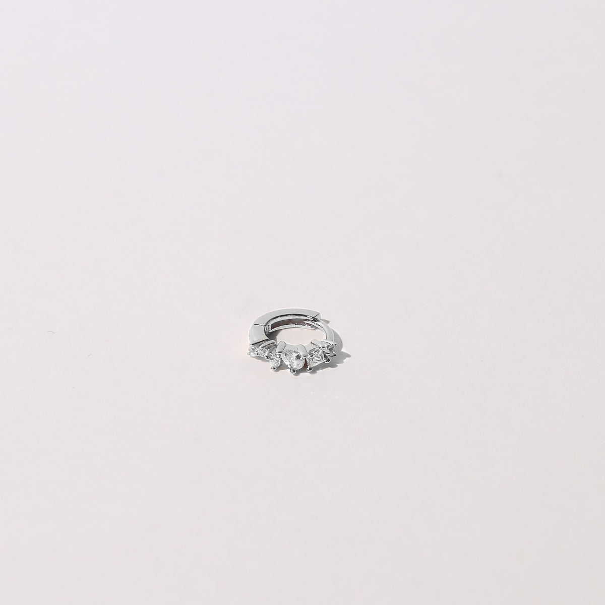 Celestial Crystal Hoop 6.5mm in Silver flat lay