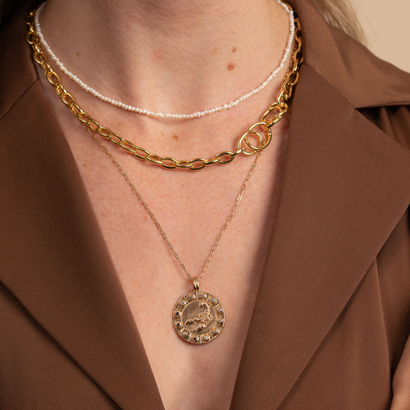 Orbit Chain Necklace in Gold worn with Zodiac Pendant Necklace