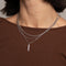 Pleated Crystal Pendant Necklace in Silver worn layered with necklaces