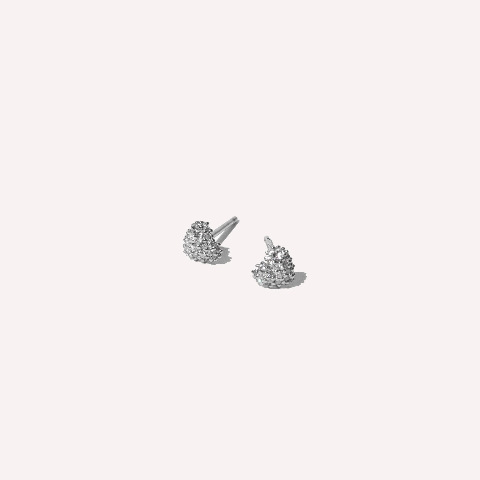 Heart Pave Stud Earrings in Silver flat lay