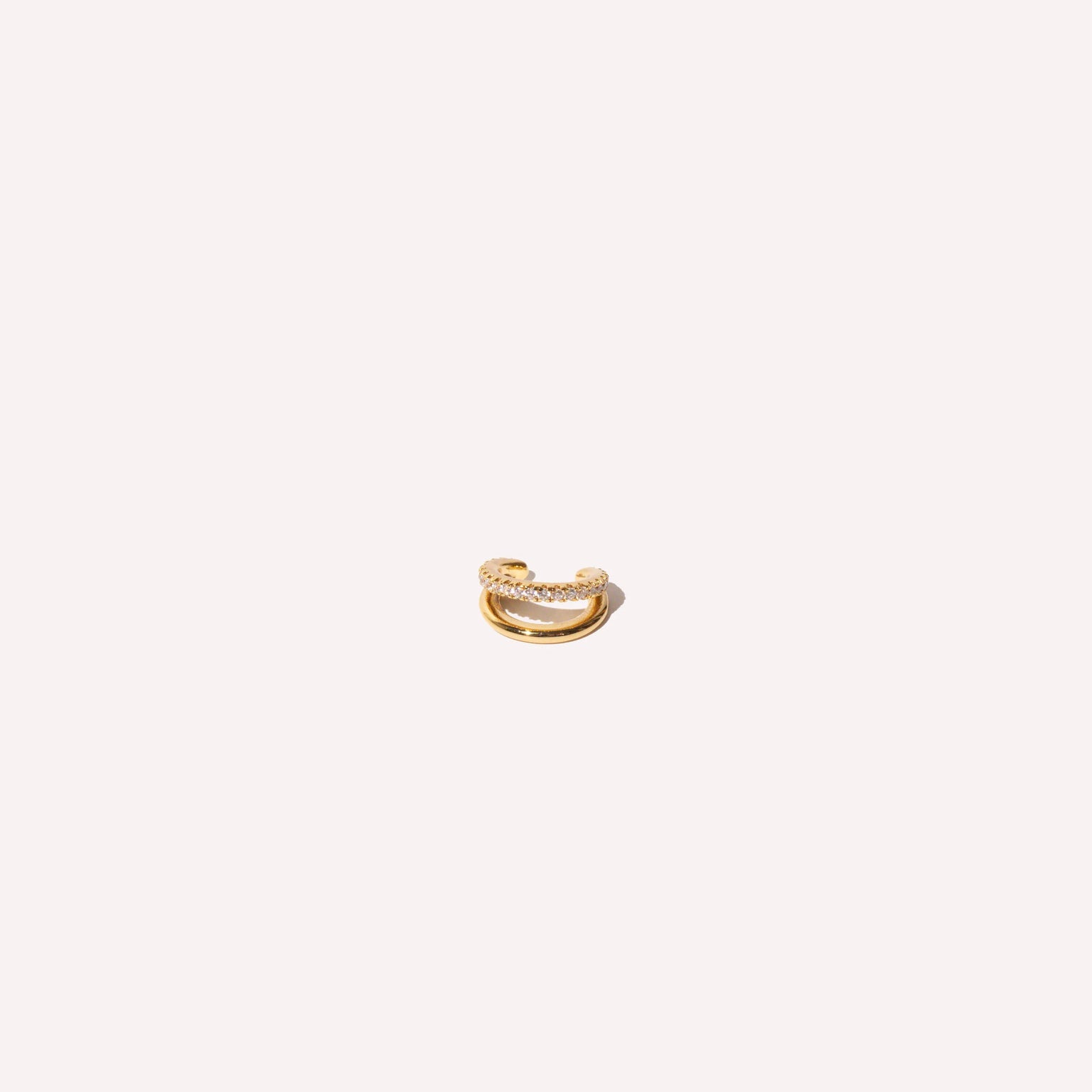 Mini Illusion Ear Cuff in Gold flat lay
