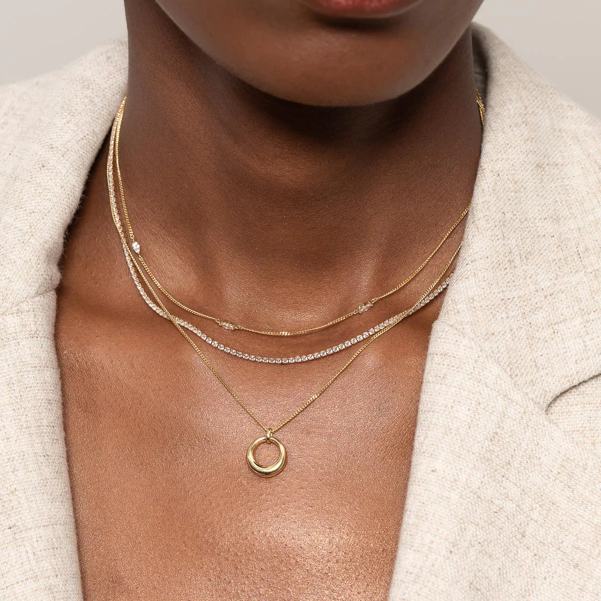 Station Navette Crystal Necklace in Gold worn layered with necklaces