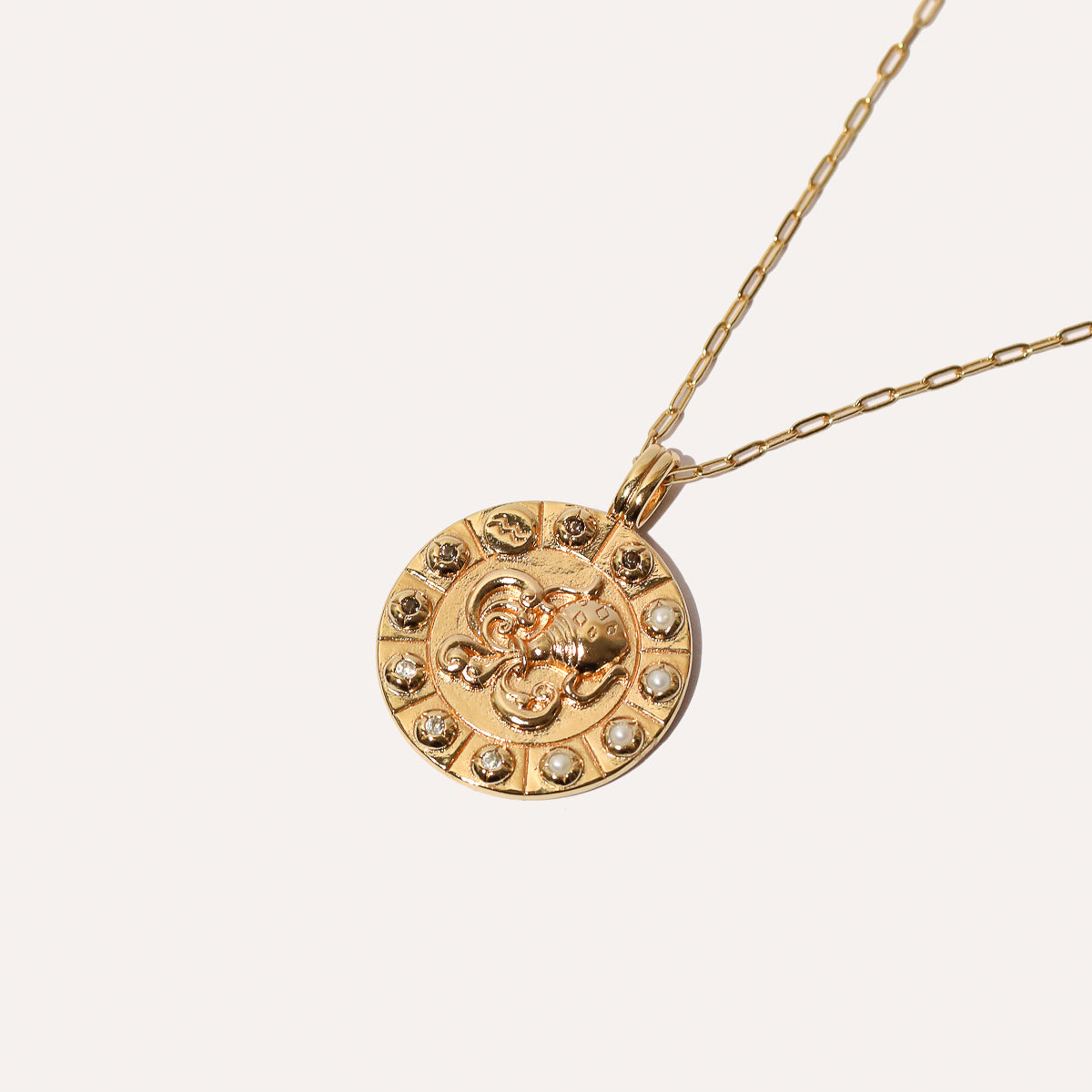 Bold Zodiac Aquarius Pendant Necklace in Gold flat lay