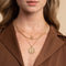 Libra Bold Zodiac Pendant Necklace in Gold worn layered with necklaces