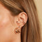 Worn shot of Molten Duo Small Hoops in Gold