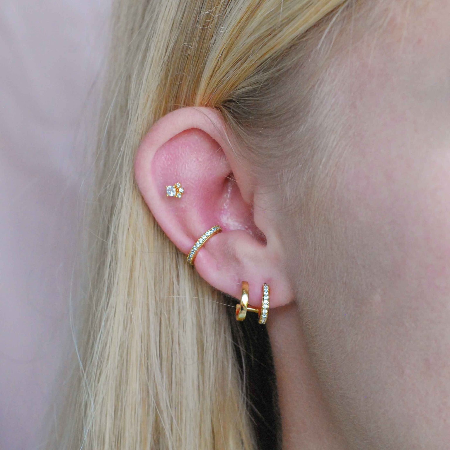 Crystal Ear Cuff in Gold worn with sparkling earrings