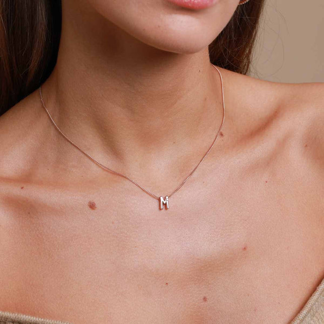 M Initial Pendant Necklace in Rose Gold worn