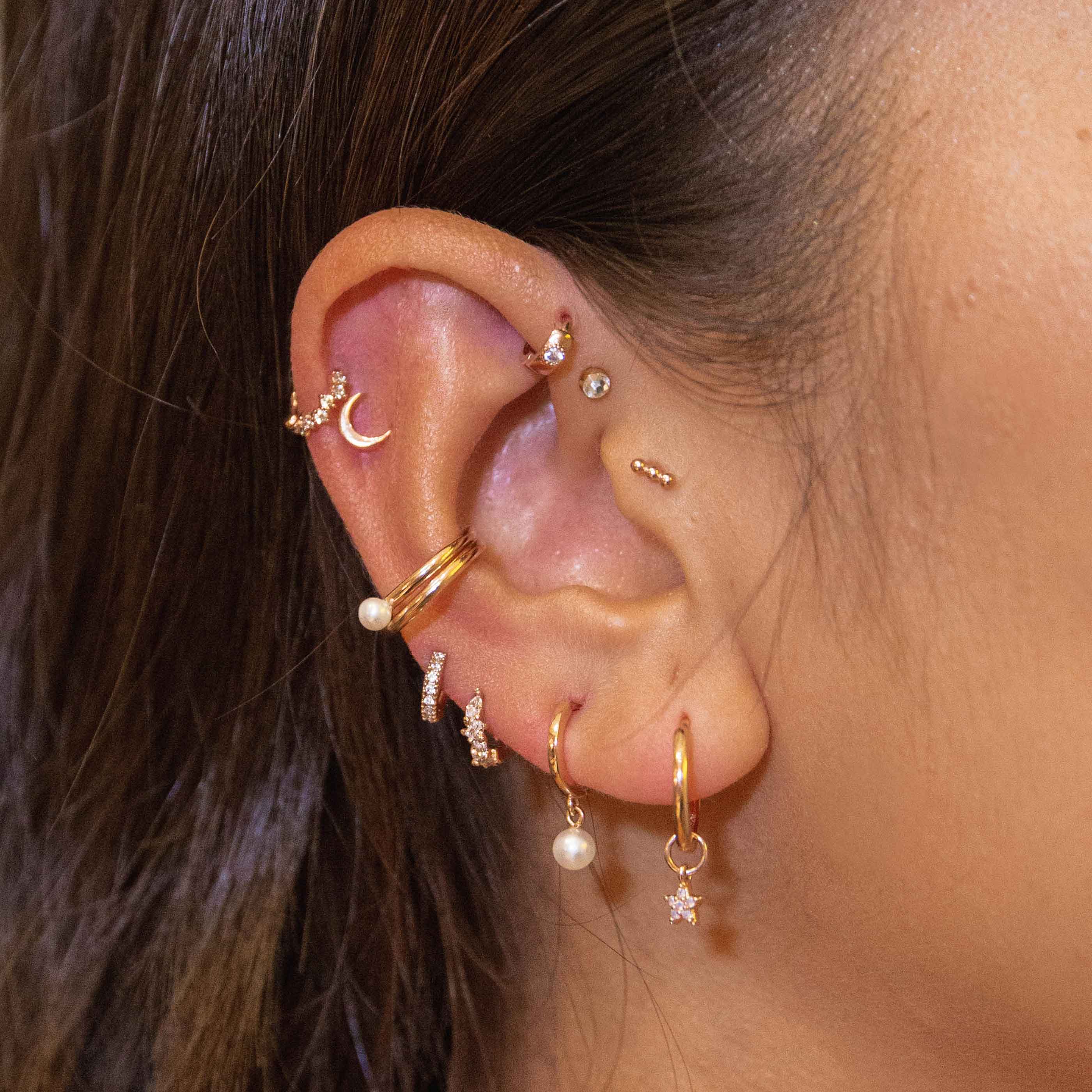 Jewelled Clicker in Rose Gold worn in upper lobe piercing