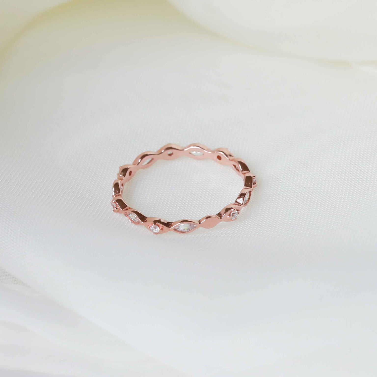 Navette-Crystal-Band-Ring-Rose-Gold-flatlay