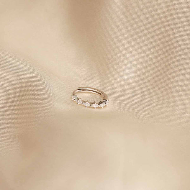 Flay lay shot of Navette Hoop 11.5mm in Silver