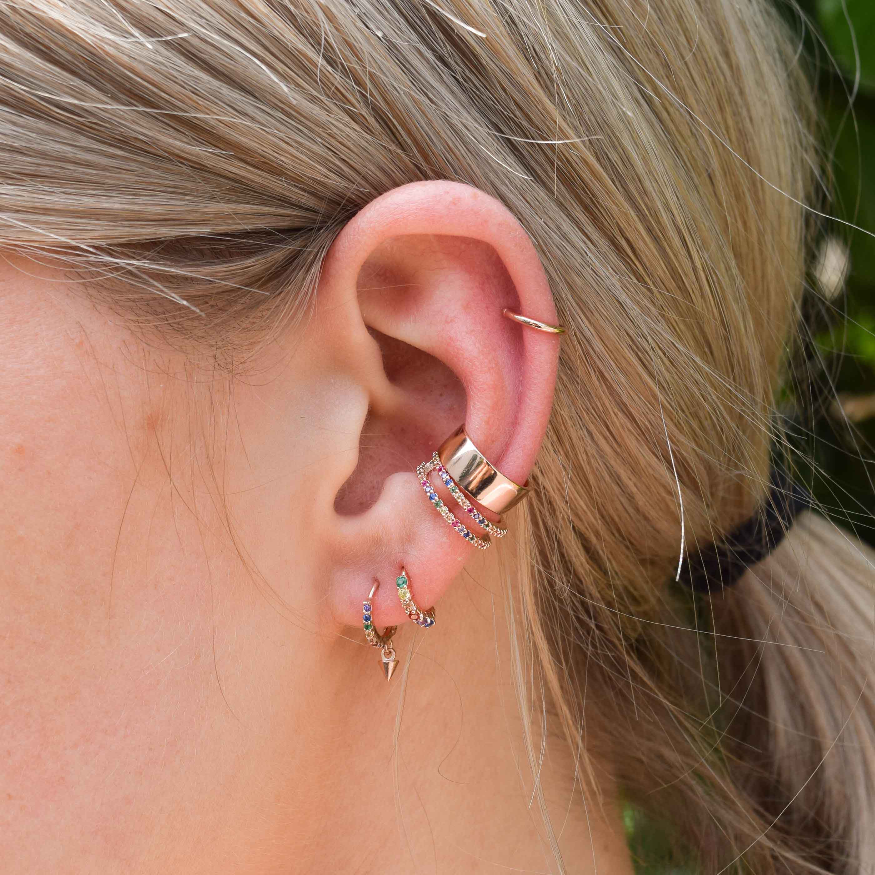 Rainbow Spike Huggies in Rose Gold worn with ear cuffs