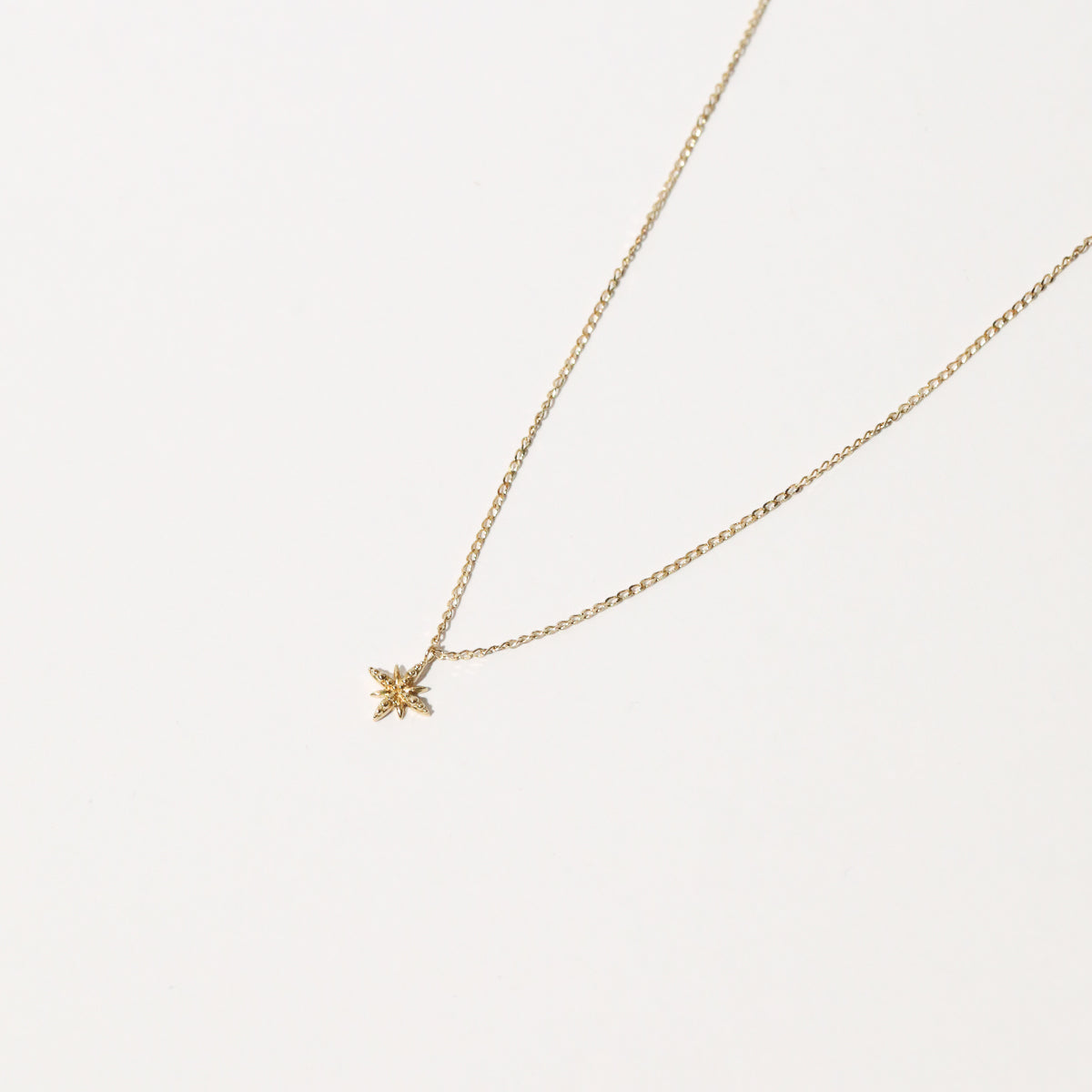 Twilight Pendant Necklace in Solid Gold flat lay