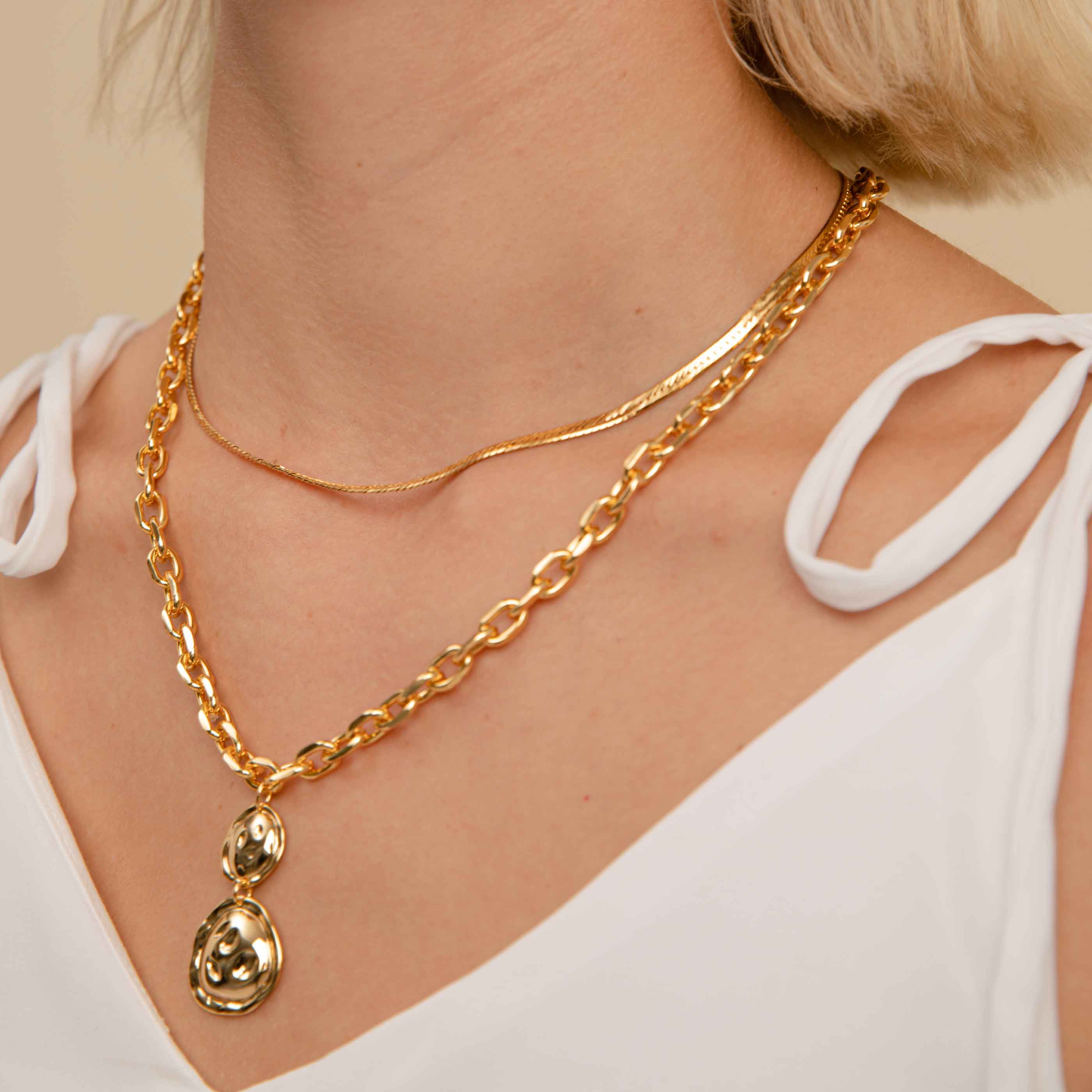 Snake Chain Necklace in Gold worn with chunky pendant necklace