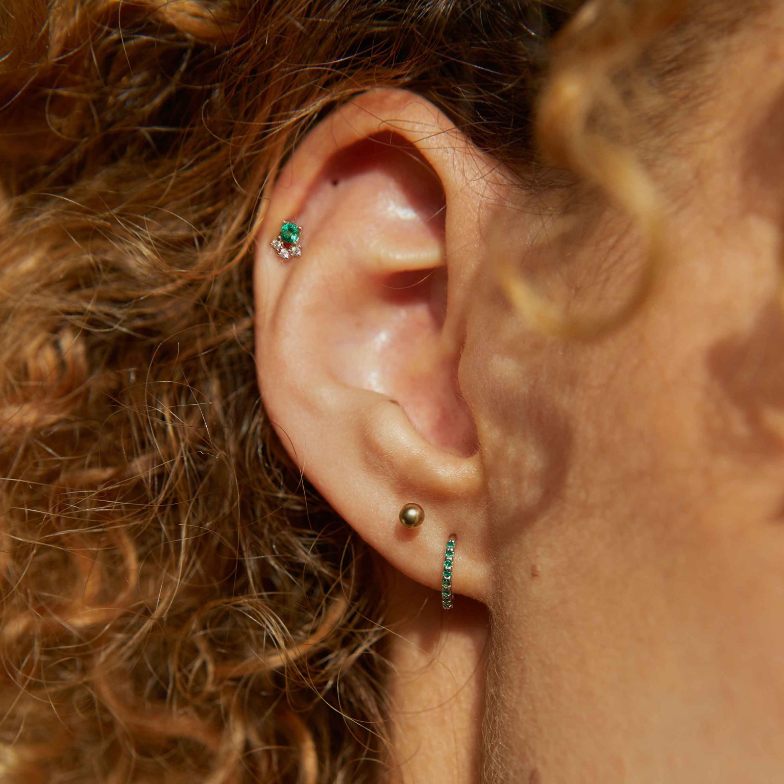 Emerald & Crystal Barbell in Gold worn in helix