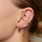 Illusion Crystal Ear Cuff in Rose Gold worn with elemental hoops and triple crystal studs