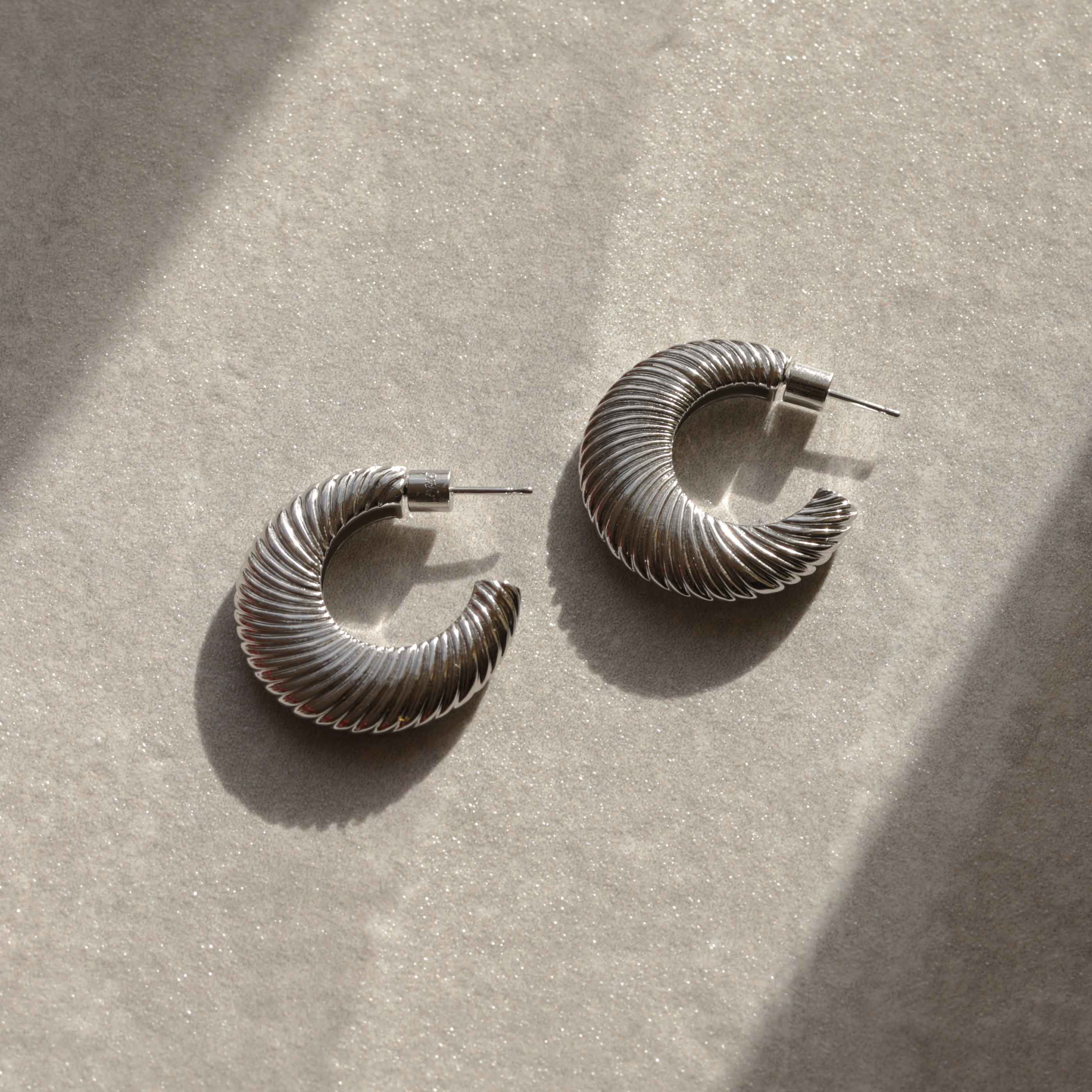 Luminous Textured Hoops in Silver