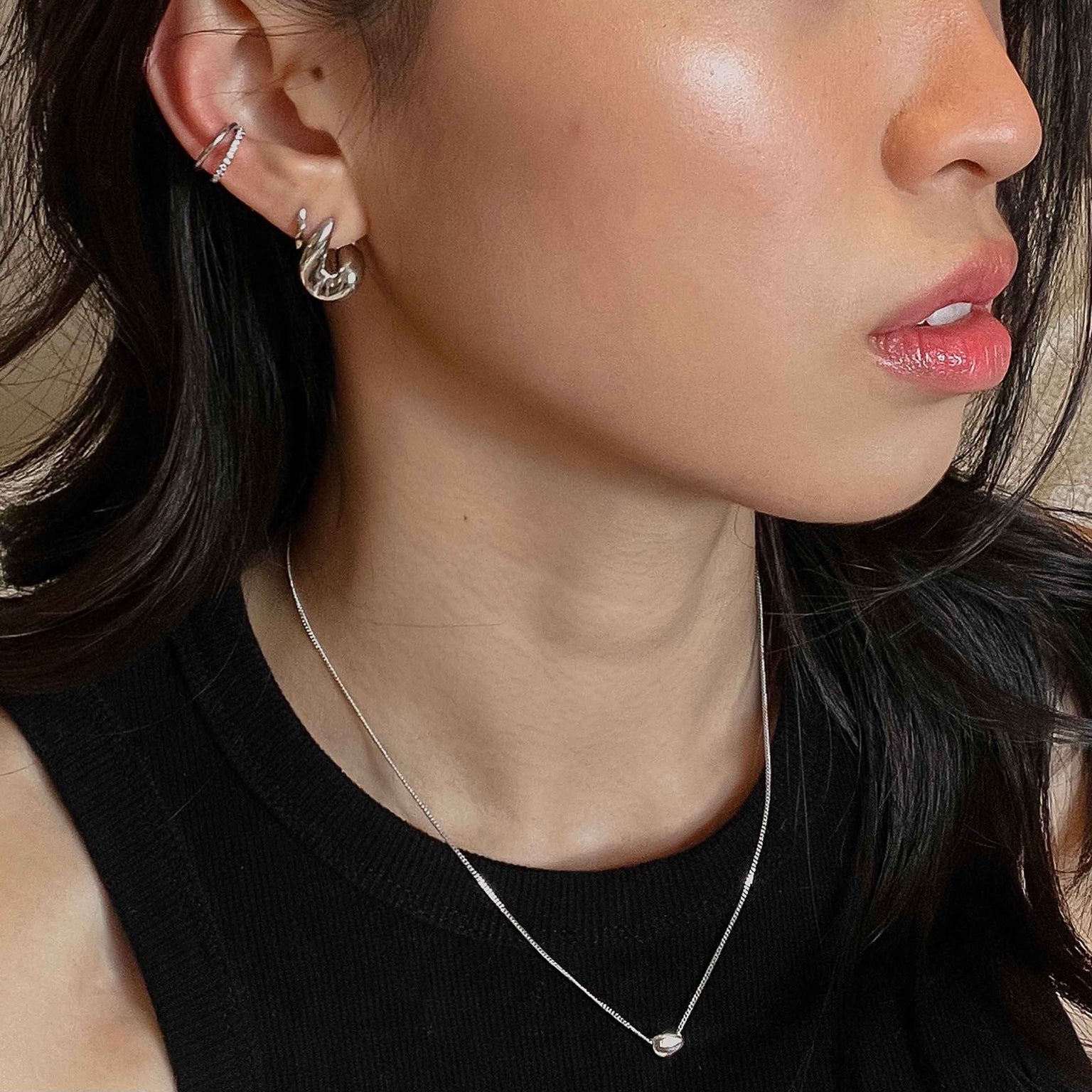 Illusion Crystal Ear Cuff in Silver worn with molten hoops and molten pendant necklace