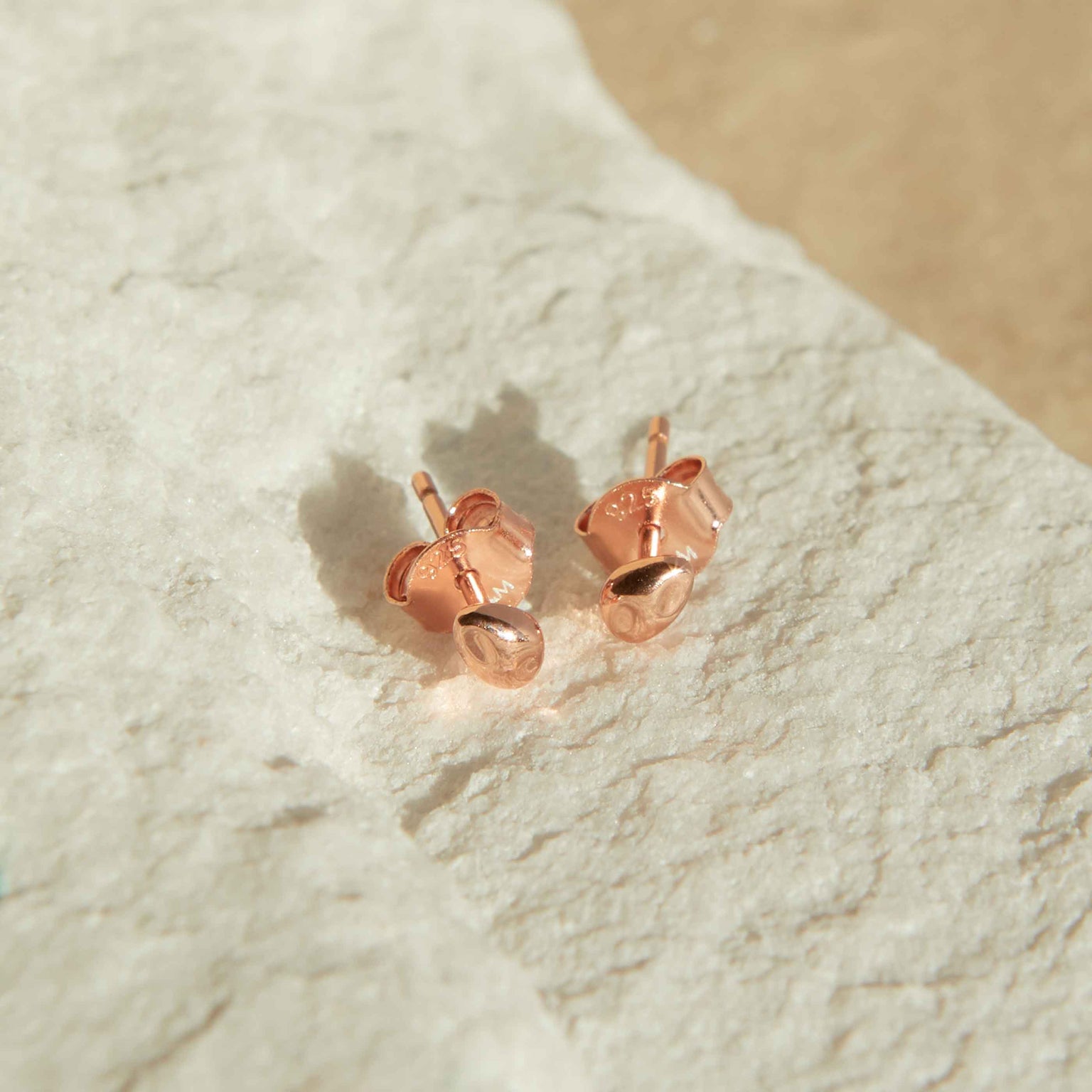 Molten Stud Earrings in Rose Gold