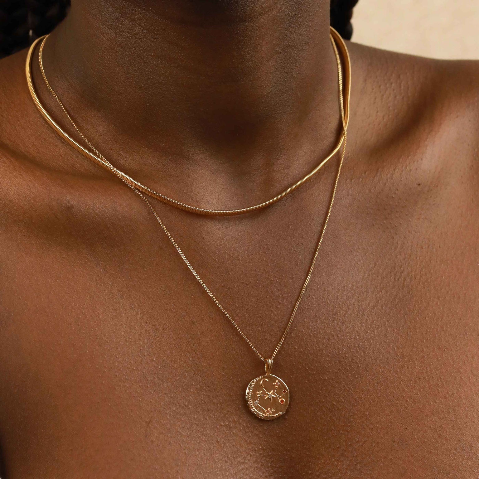 Oval Snake Chain Necklace in Gold layered with zodiac pendant necklace