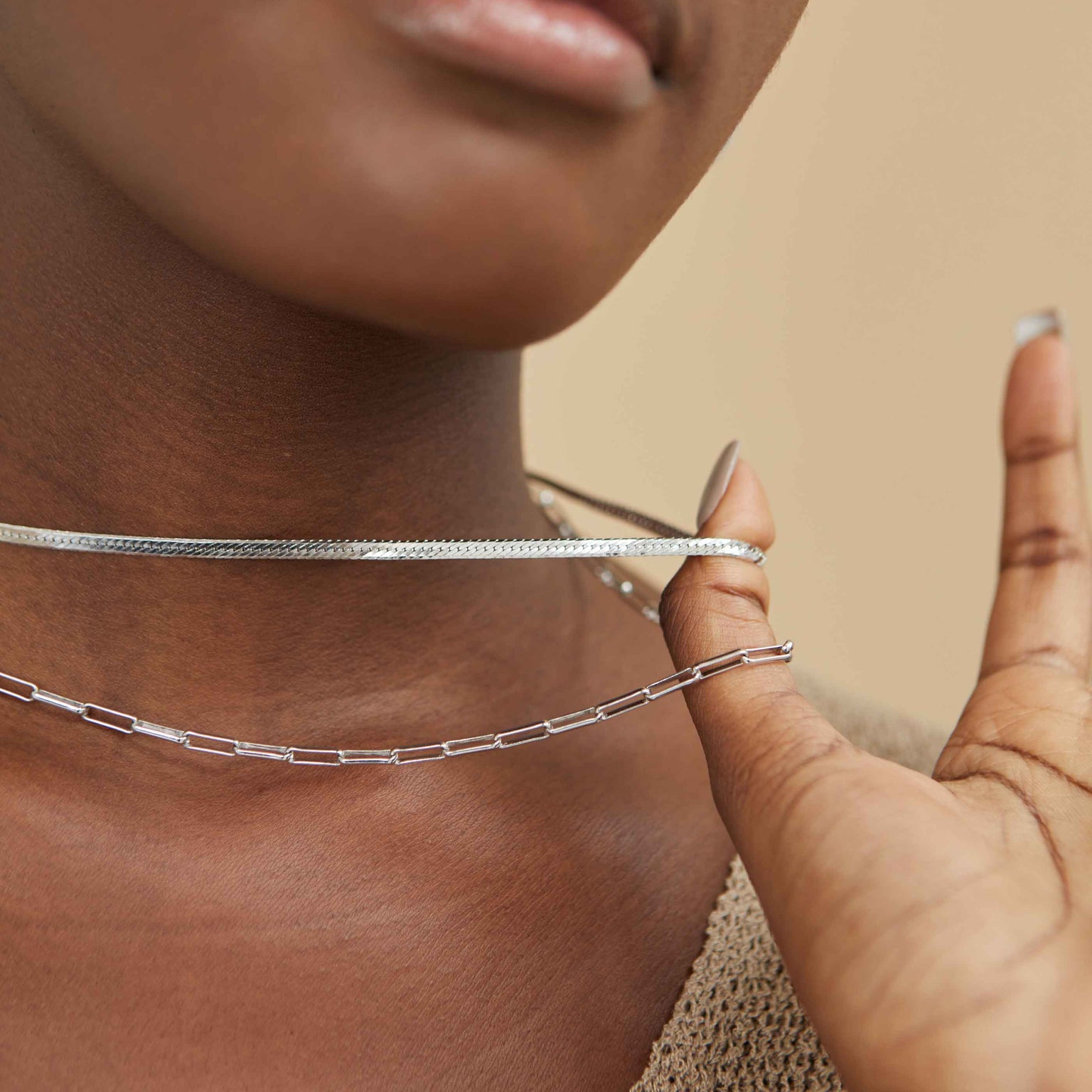 Snake Chain Necklace in Silver worn with long link chain necklace